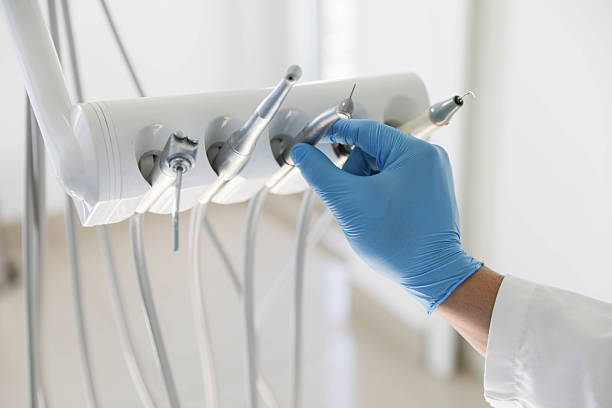 Professional Tooth Extraction technician working in Kincheloe, MI